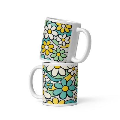 Seamless 70s retro floral pattern mug with teal and yellow daisies and wavy lines on a light background.