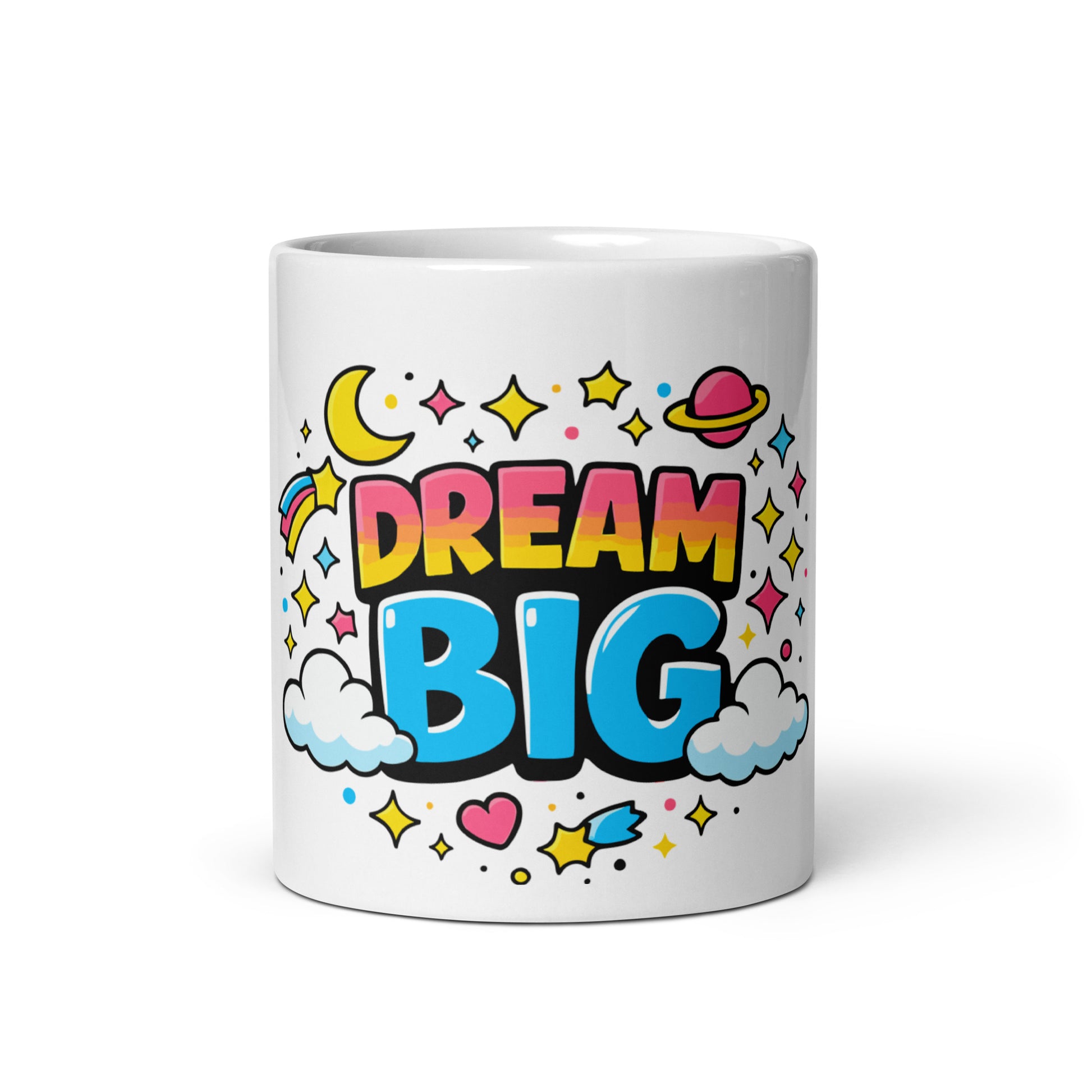 Vibrant "Dream Big" typography with a pink planet, yellow moon, and colorful stars on a black ceramic coffee mug.