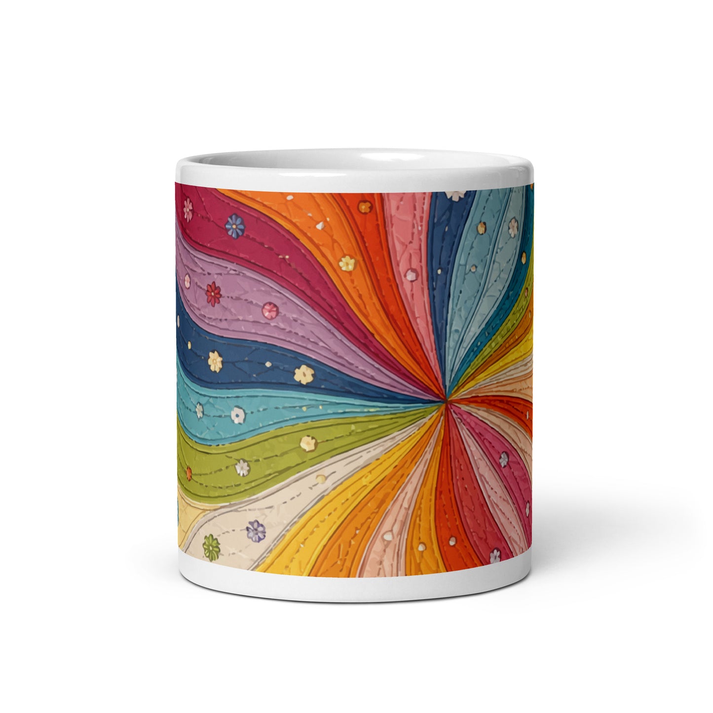 Ceramic mug with a colorful retro 70s quilted rainbow swirl design featuring stitched details and small vintage flowers.