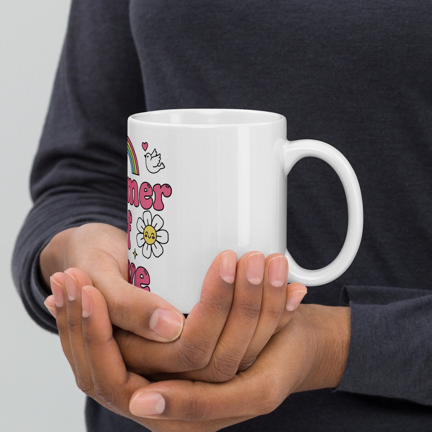 Retro Summer of Love illustration with rainbow, peace sign, sun, and daisy icons in pink and pastel colors on a mug.