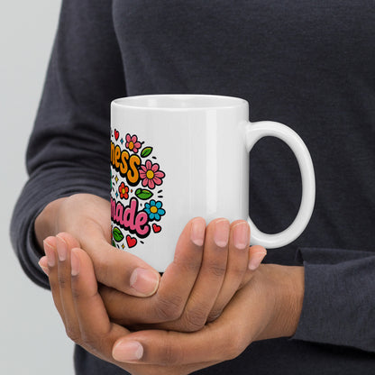 Retro coffee mug featuring 'Happiness is Homemade' text with 70s-style flowers and hearts on a black background.