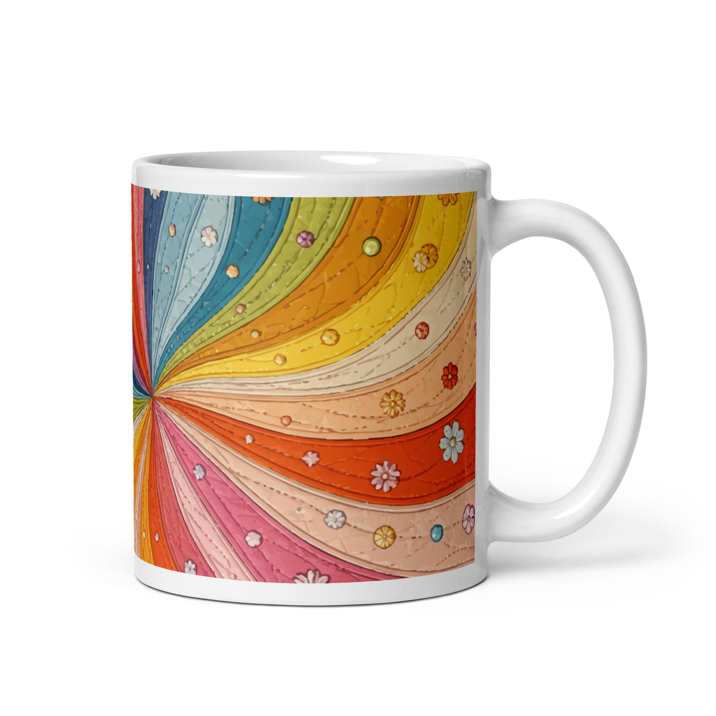 Ceramic mug with a colorful retro 70s quilted rainbow swirl design featuring stitched details and small vintage flowers.