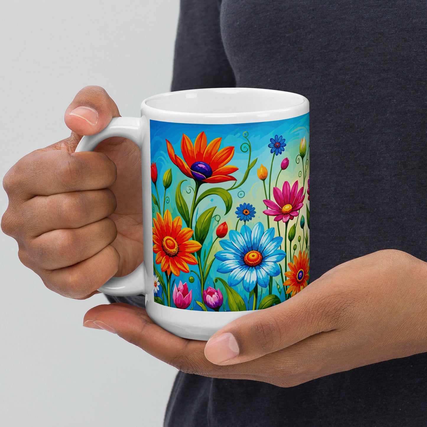 Vibrant retro flower power ceramic mug featuring a colorful field of psychedelic 1960s style wildflowers and daisies.