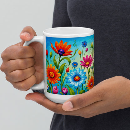 Vibrant retro flower power ceramic mug featuring a colorful field of psychedelic 1960s style wildflowers and daisies.