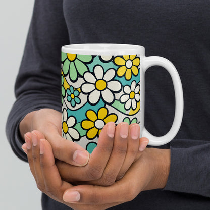 Seamless 70s retro floral pattern mug with teal and yellow daisies and wavy lines on a light background.