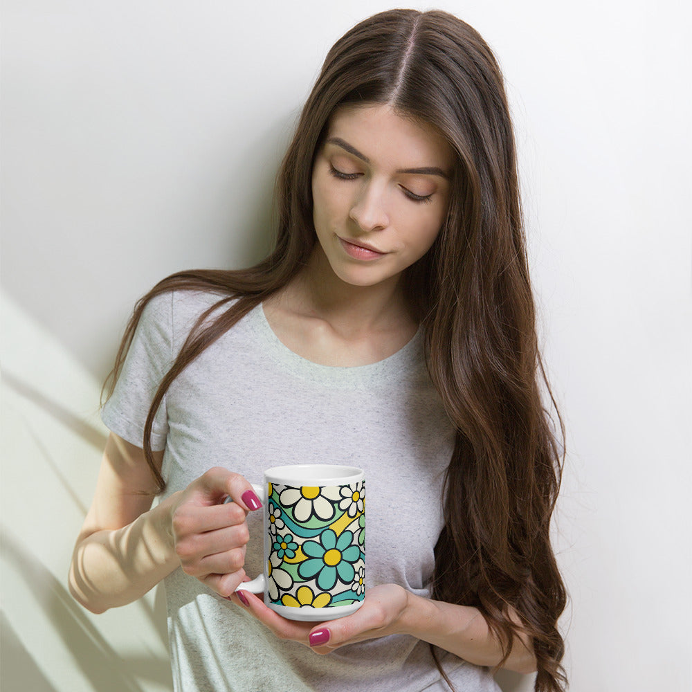 Seamless 70s retro floral pattern mug with teal and yellow daisies and wavy lines on a light background.