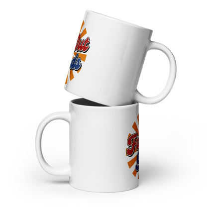 Far Out Goods retro logo mug with red and blue 70s-style script over an orange and yellow sunburst design.